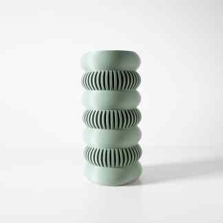 Sleek 3D printed sculpture with layered textures, showcasing AM Square 3D’s creative craftsmanship.