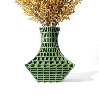Detailed 3D printed green vase with intricate lattice pattern, holding dried floral arrangement, on white background.