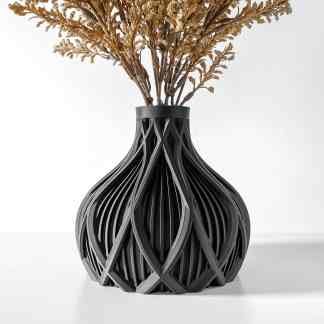 3D printed black vase with detailed lattice pattern for modern home decoration.