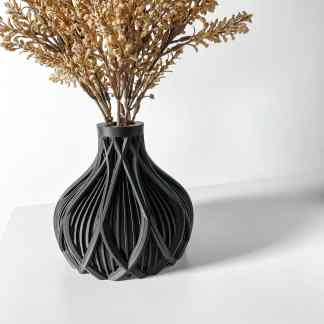 Vase with dried flowers, 3D printed design, modern home decor piece.
