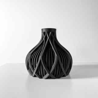 Elegant black 3D-printed vase with intricate geometric patterns.