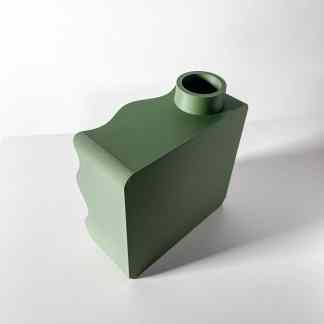 Green 3D-printed container with a circular opening, showcasing advanced additive manufacturing and design.