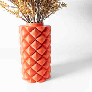 Colorful 3D printed pineapple vase with dried floral arrangement for contemporary interior design.