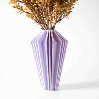 Beautiful purple geometric vase with intricate folding design for contemporary interior style.