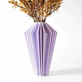 Elegant purple 3D-printed vase with geometric patterns holding dried floral arrangement.