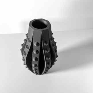 High-quality 3D printed textured black sculpture, modern design, intricate details.
