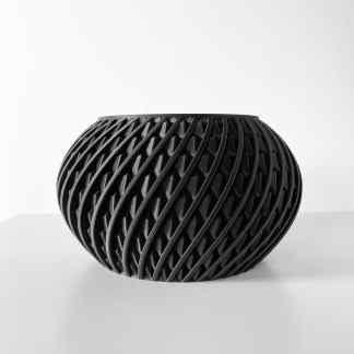 Black 3D printed vase showcasing complex lattice structure and modern art style.