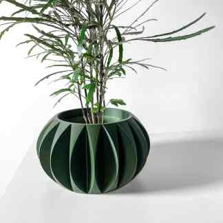 3D printed geometric vase in green with a unique folded pattern, perfect for contemporary home decor.
