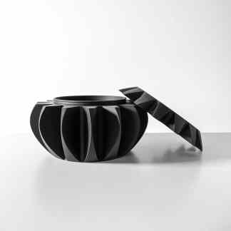 Black 3D-printed container with lid, featuring contemporary geometric patterns, ideal for modern decor.