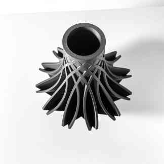 Highly detailed black and white 3D printed turbine component for industrial use.