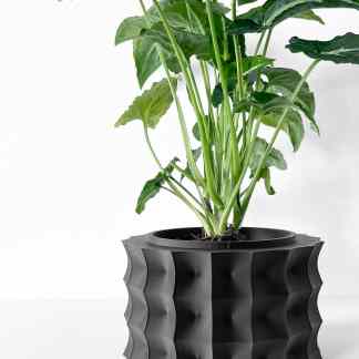 Detailed black 3D printed plant pot, unique wavy pattern, ideal for stylish home decor.