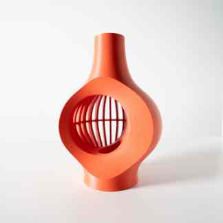 Modern 3D-printed orange vase showcasing innovative design and craftsmanship.
