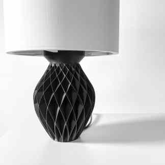 Elegant black 3D printed table lamp with textured surface and white lampshade.