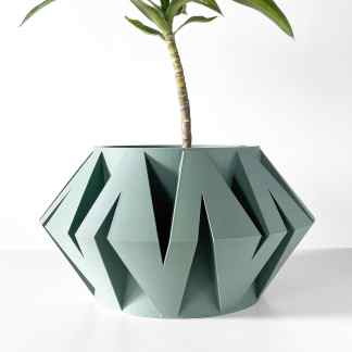 3D printed geometric plant pot with stylish green finish, perfect for modern decor.