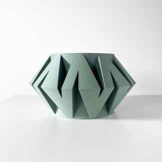 Geometric 3D printed vase for interior decoration, modern stylish home accessory.
