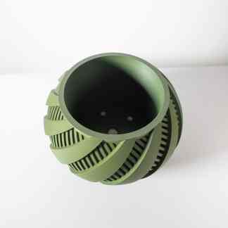3D printed green turbine component for engineering, industrial, and prototyping uses.