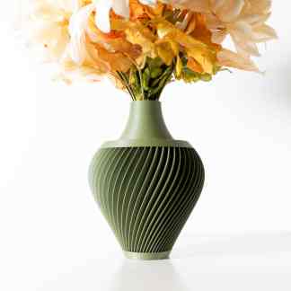 Vibrant floral bouquet in a sleek, green 3D-printed vase on a white background.