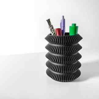 3D printed pen holder with innovative spiral design and colorful pens, ideal for desk décor.