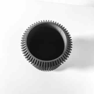 Close-up of a high-quality 3D printed gear with detailed teeth for industrial use.