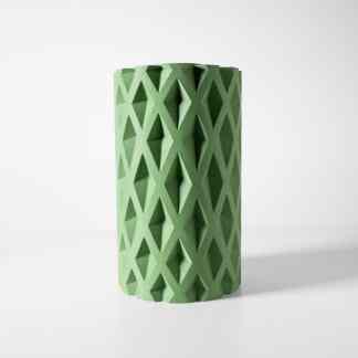 Vibrant green decorative 3D printed foam sculpture displaying intricate geometric pattern.