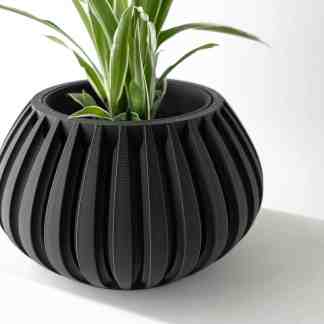 Highly detailed 3D-printed black flowerpot with vertical slats, ideal for contemporary interiors and plant lovers.
