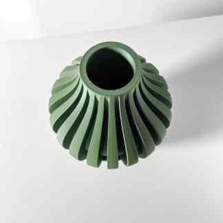 Precision 3D-printed green turbine part highlighting advanced additive manufacturing technology.