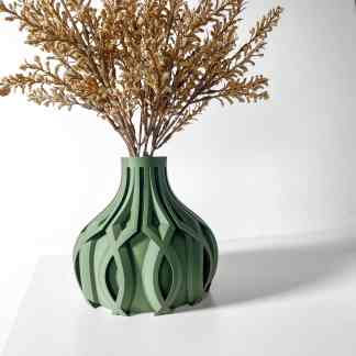 Versatile green 3D printed vase with intricate design, perfect for home decor or floral arrangements.