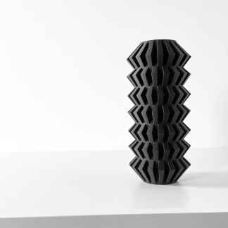 Stunning 3D printed black geometric vase showcasing modern design and craftsmanship.