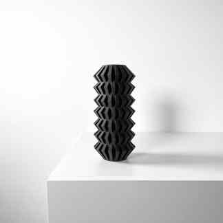 This image features a sleek, black 3D-printed geometric vase with intricate lattice design.