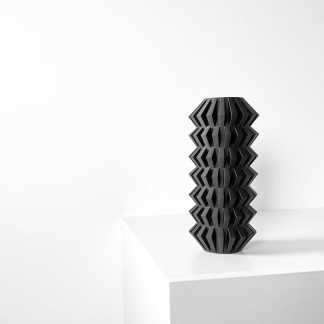 High-quality black 3D printed vase with geometric pattern design.