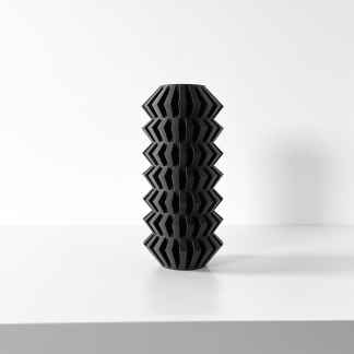 Black geometric 3D printed vase for modern home decor.