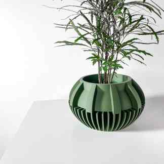 Stylish 3D-printed planter with unique geometric design, perfect for interior decor and plant lovers.