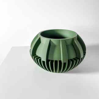 A sleek, modern green geometric vase created with 3D printing technology, perfect for contemporary interior decoration.