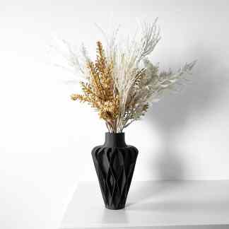 Stylish 3D-printed black vase with dried flowers, ideal for contemporary home decoration.
