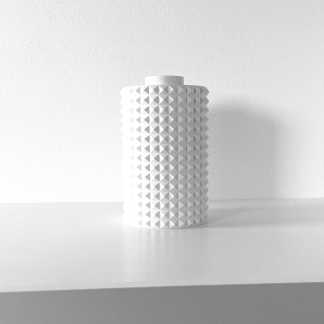 White textured ceramic vase with geometric pattern, stylish modern decor piece.