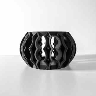 Stylish black 3D printed vase with detailed lattice structure, perfect for modern home decor.