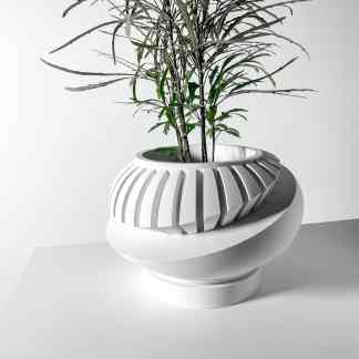 Geometric 3D printed flower pot with sleek white design for modern home decor.