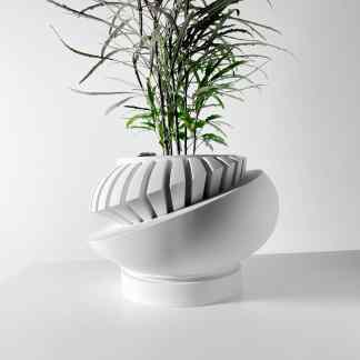 Unique 3D printed white plant pot with geometric detailing, perfect for modern interior design.