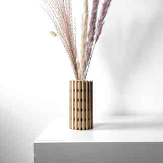 Elegant 3D-printed wooden vase featuring pampas grass, perfect for stylish home decoration.