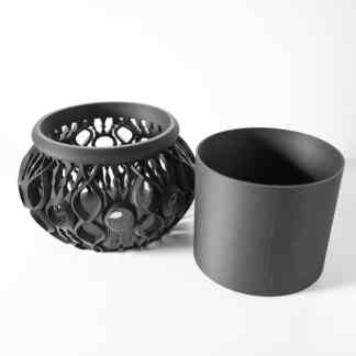 Highly detailed 3D printed geometric models in black, showcasing advanced additive manufacturing techniques.