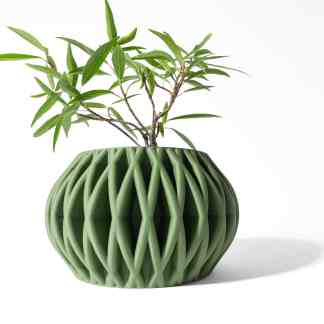 Elevated white background highlights a stylish 3D printed green ceramic planter with a contemporary lattice pattern.