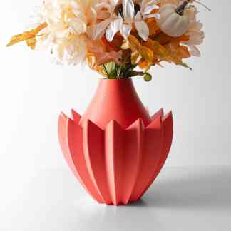 Decorative orange flower vase with intricate 3D-printed geometric details for modern home interior.