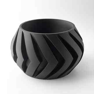 Black 3D printed geometric bowl with modern design and intricate pattern.