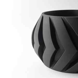 Black 3D printed geometric vase for modern home decor, showcasing advanced 3D printing technology and artistic craftsmanship.