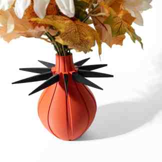 3D printed decorative vase with artificial floral arrangement, featuring sleek design and vibrant color.