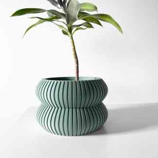 Unique ribbed 3D-printed plant pot in green color for indoor garden displays.