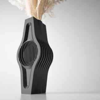 Innovative 3D-printed filament spool holder with sleek design for 3D printers.