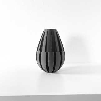 Sleek black 3D printed vase, minimalist design, perfect for contemporary home decor.