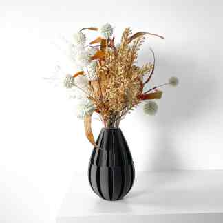 Elegant 3D printed black vase with dried floral display, perfect for stylish interior decoration.