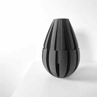 3D printed modern sculpture with sleek black finish.